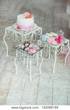 Beautiful multicolored decorated baked sweet tasty candy bar desserts