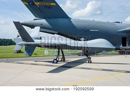 BERLIN GERMANY - JUNE 03 2016: Unmanned combat air vehicle General Atomics MQ-9 Reaper. US Air Force. Exhibition ILA Berlin Air Show 2016