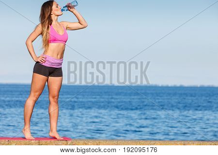 Woman Drinking Water After Sport Gym Outdoor