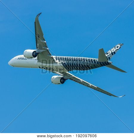 BERLIN GERMANY - JUNE 03 2016: Demonstration flight Airbus A350 XWB. Exhibition ILA Berlin Air Show 2016