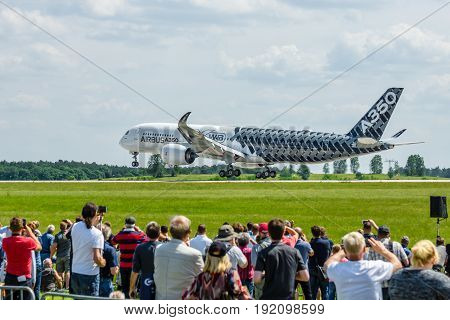 BERLIN GERMANY - JUNE 03 2016: Demonstration flight Airbus A350 XWB. Exhibition ILA Berlin Air Show 2016