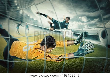 Goalkeeper in gates jumping to catching ball and players in action at stadium. Collage. Advertising concept of soccer football