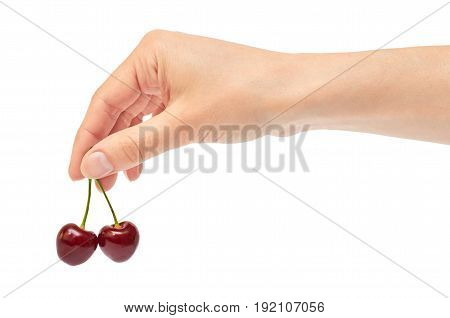 Beautiful Female Hand Holds Cherry Gesture. Isolated On White Background