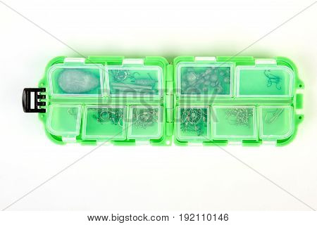 Plastic fishing box on white background. Tackle box with binding element isolated.