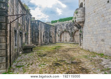 The Courtyard Is In The Military Fortress Of Mamula. Montenegro, Boka-kotor Bay.