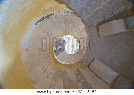 Narrow Spiral Staircase In The Tower Of The Fortress Of Mamula. Montenegro, Boka-kotor Bay.