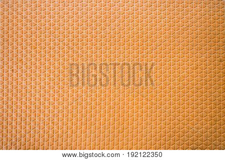 Orange rubber floor with beautiful patterns complex background.