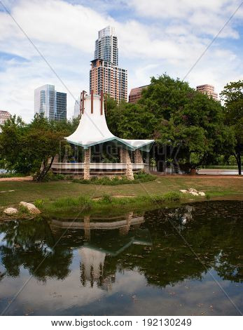 One person sits at the park in this scene Austin Texas