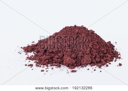 caput mortuum dark pigment on a white background