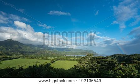 View over Hanalei bay and Na Pali range after a storm with rainbow near Hanalei, Kauai, Hawaii