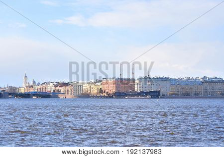 View of Neva River and Mytninskaya quay on Petrograd side in center of St.Petersburg at sunny spring day Russia.