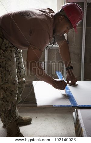 US Navy Seabees help Habitat for Humanity NYC on a housing building project in Brooklyn during Fleet Week New York, celebrating Sea Services and 75th anniversary of the Seabees, NEW YORK MAY 25 2017.