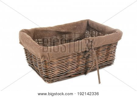 Empty wicker bread basket isolated on white