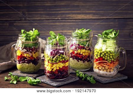 Homemade vegetable salad in a glass jar