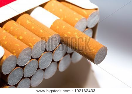 A pack of cigarettes at white background