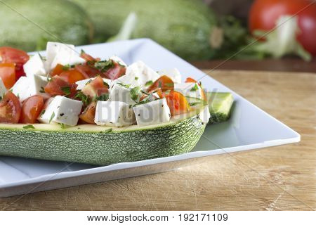 zucchini whit Mexican Panela cheese, cherry tomatos, coriander, salt and pepper