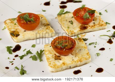 Roasted mexican Panela cheese, cherry tomatos, coriander, salt, pepper and soy sauce