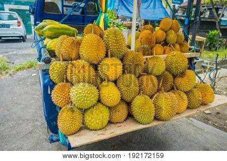 Durian fruits street market stall, Sumatra, Indonesia. Durian regarded by many people in southeast Asia as the king of fruits .
