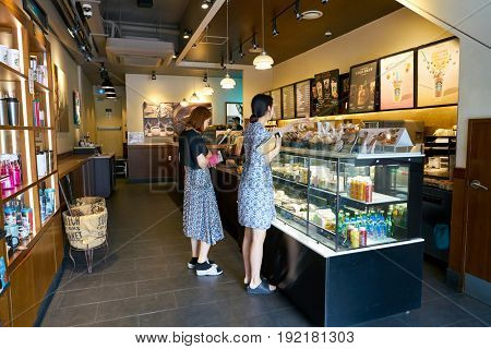 SEOUL, SOUTH KOREA - CIRCA MAY, 2017: display case at Starbucks in Seoul. Starbucks Corporation is an American coffee company and coffeehouse chain.