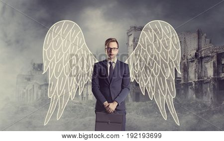 Business angel standing over apocalyptic background. Crisis, default, setback concept.