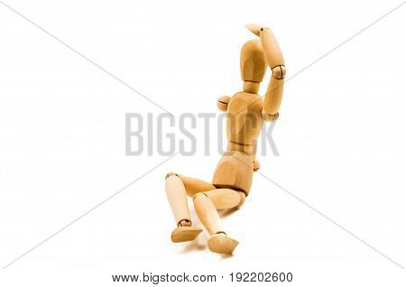 wooden man puppet sitting protecting eyes on white background