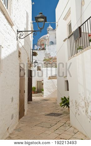 Characteristic alleyway of Locorotondo. Puglia. Southern Italy.