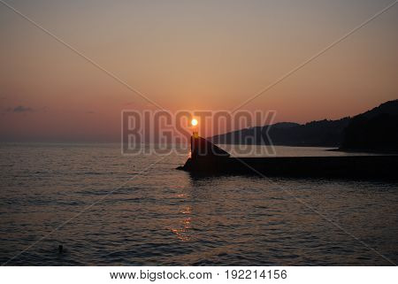 Sunset above mountains around sochi fisherfolk black see