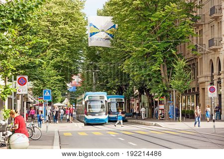 Zurich Shopping Street Bahnhofstrasse With Tram And Flag