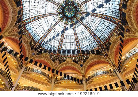 Paris France - May 30 2017: Inside part of the famous Galeries Lafayette with it's brand stands Hermes Chanel and Givenchy in Paris France