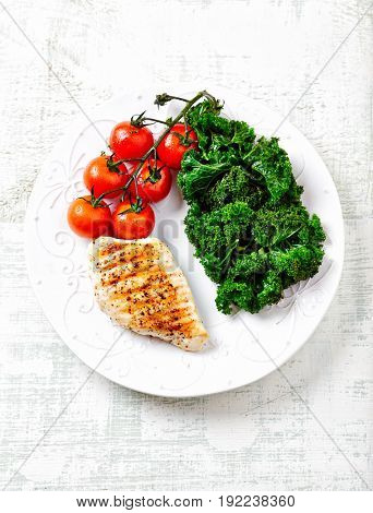 Grilled Chicken Breast with Cherry Tomatoes and Kale