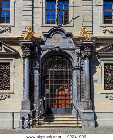 Zurich, Switzerland - 18 June, 2017: entrance to the Rathaus building, closed on Sunday. The Rathaus is Zurich's Town Hall, it was built during 1694-1698, the canton of Zurich owns it since 1803.