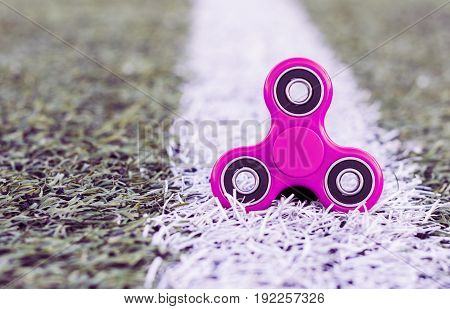 the popular pink spinner gadget in 2017 line of the soccer (football) artificial field