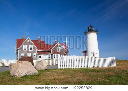 Cape Cod USA - July 12 2016: Nobska Light also known as Nobska Point Light is a lighthouse located in Woods Hole on the southwestern tip of Cape Cod Massachusetts.