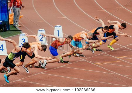 Chelyabinsk Russia - June 4 2017: sprinters runners men start running 100 metres during UrFO Championship in athletics