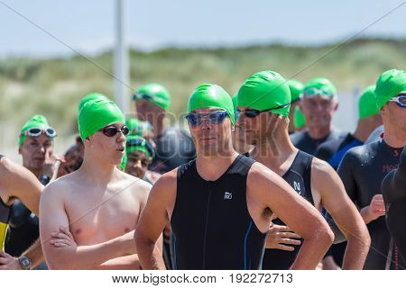 Kijkduin The Hague the Netherlands - 17 June 2017: Kijkduin cross triathlon competitors waiting at start line