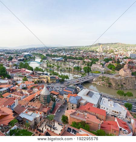 Tbilisi city panorama. Old city, new Summer Rike park, river Kura, the European Square and the Bridge of Peace