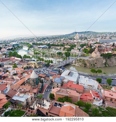 Tbilisi city panorama. Old city, new Summer Rike park, river Kura, the European Square and the Bridge of Peace