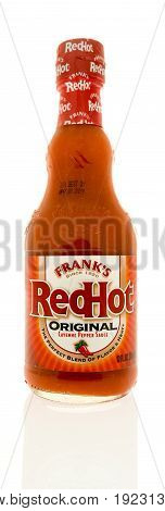 Winneconne WI -13 June 2017: A bottle of Frank's Redhot original cayenne pepper sauce on an isolated background
