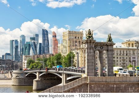 MOSCOW RUSSIA - JUNE 6 2017: Borodinsky bridge Moscow river skyscrapers of international business center 
