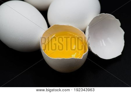 Fresh Eggs On The Black Background