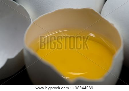 Fresh Eggs On The Black Background