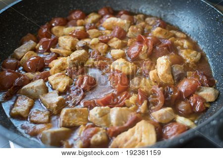 mixed fish and tomatoes as condiment for pasta called misto mare