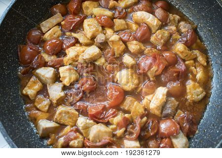 mixed fish and tomatoes as condiment for pasta called misto mare