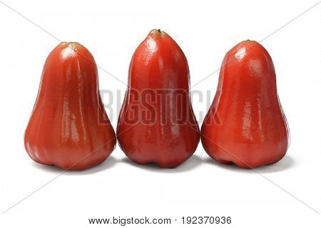 Row of Three Fresh Watery Rose Apples on White Background