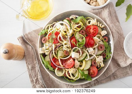 spiralized courgette salad greek style with tomato feta olives cucumber