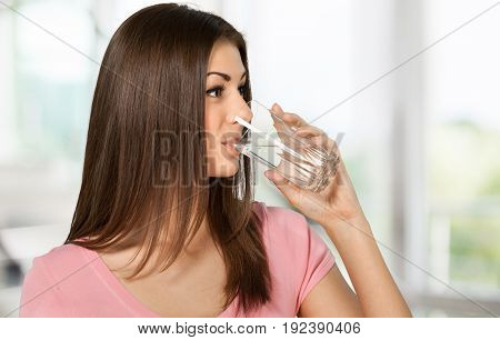 Young water drink woman drinking young adult background