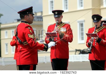 Sandhurst, Uk - June 18 2017: Conductor And Woodwind Players Of The Military Band Of The Corps Of Ro