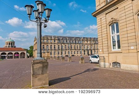 a lamp in front of a castle