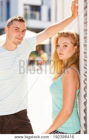 Man Flirting With Girl On City Street