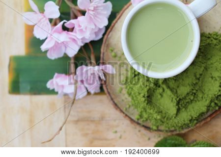 Hot green tea and matcha tea powde